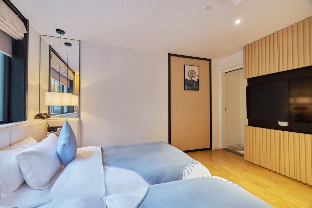 Фото Wuhua Xingxiang Shanfang Hotel