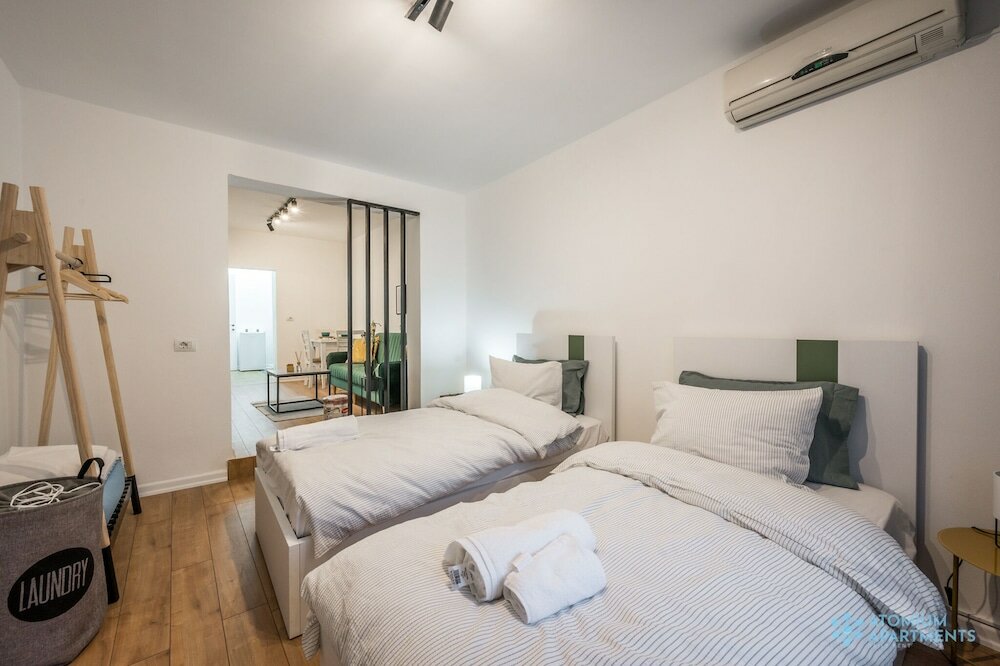 Фото Atomium Apartments