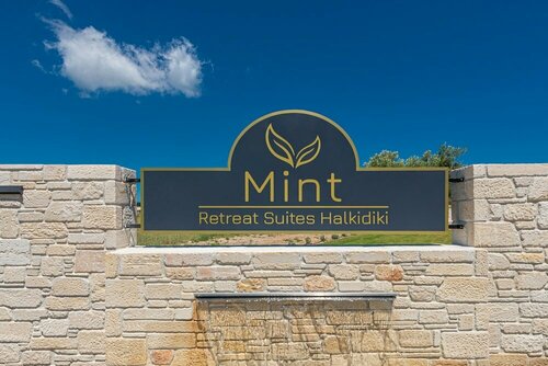 Гостиница Mint Retreat Suites