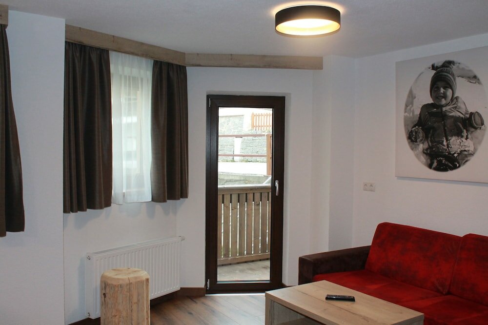 Фото A Casa Juwel - Ski in & Out Appartements