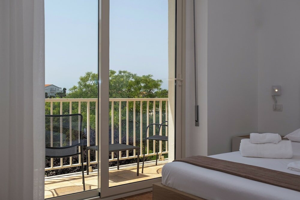 Фото Nautika Suites