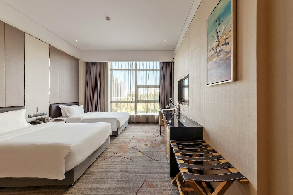 Фото Tianyuan Junlong Hotel