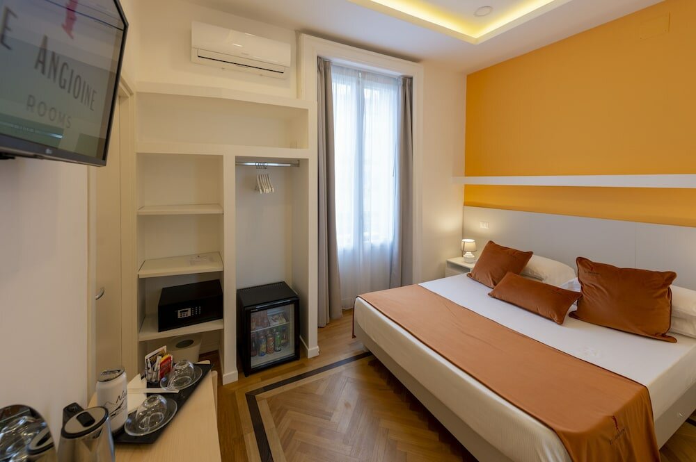 Фото Le Angioine Rooms