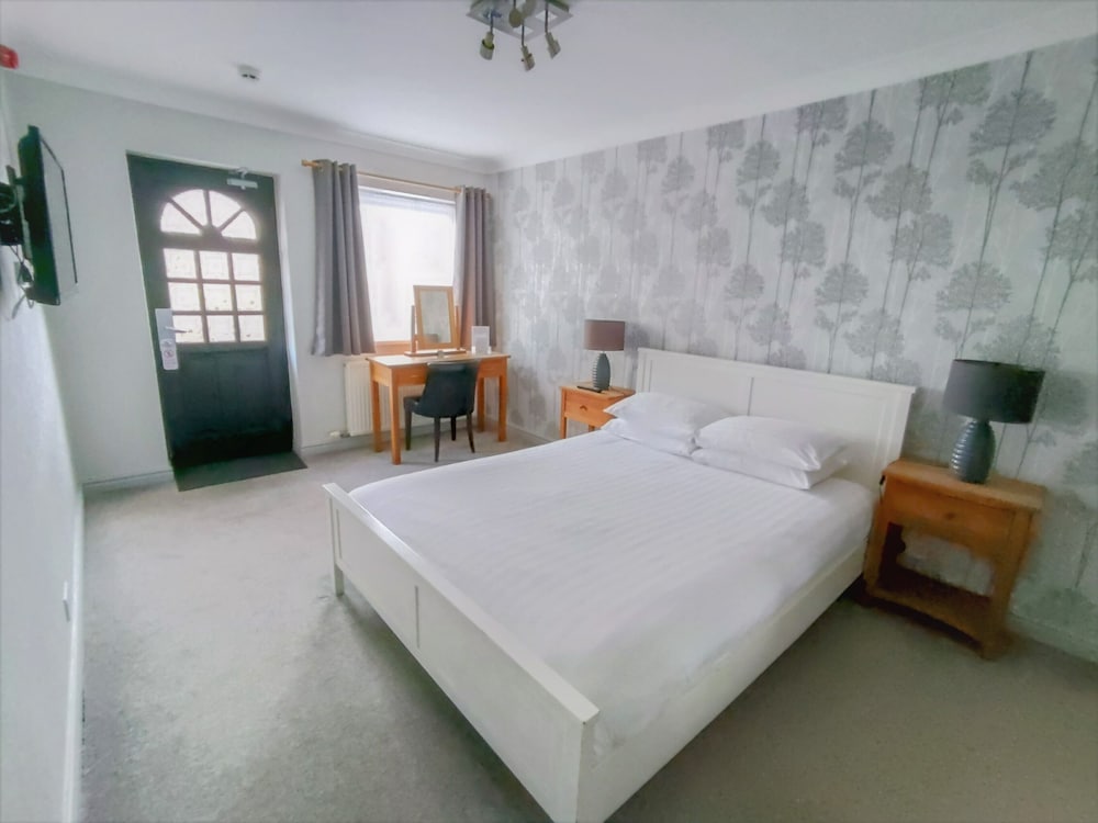 Фото Woodcote Hotel