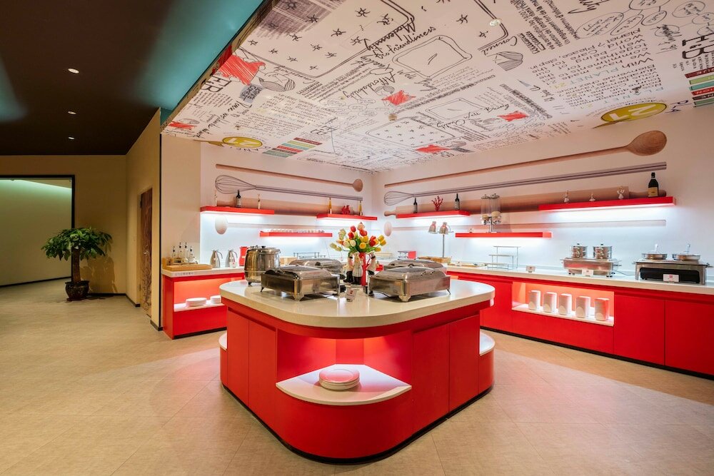 Фото Ibis Dalian Yida Spring Field Hotel