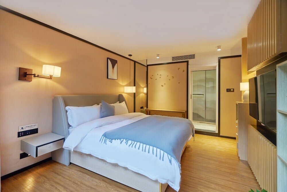 Фото Wuhua Xingxiang Shanfang Hotel