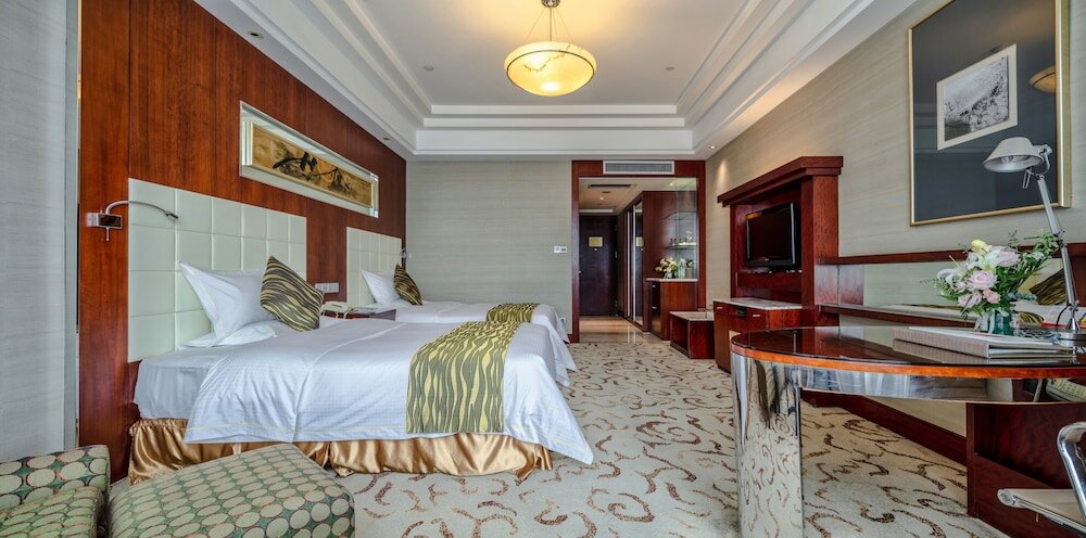 Фото Yungang Jianguo Hotel