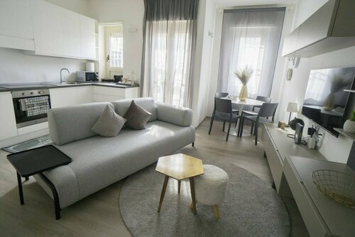 Апартаменты Charming and Modern Three-bedroom Apartment in the Heart of the City of Asti в Асти