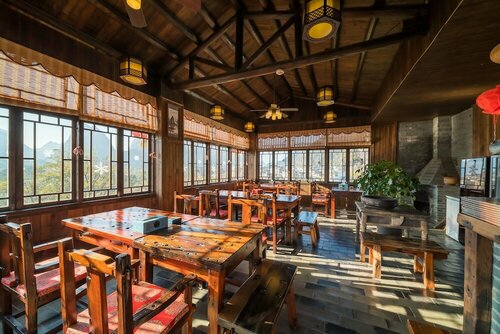 Гостиница Yangshuo Mountain Nest Boutique Hotel
