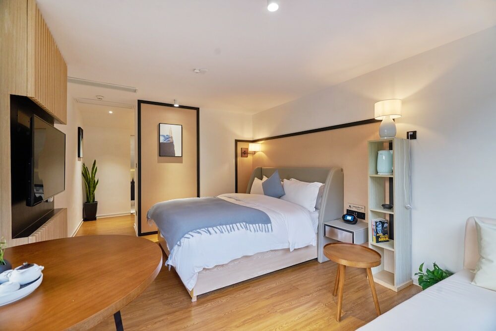 Фото Wuhua Xingxiang Shanfang Hotel