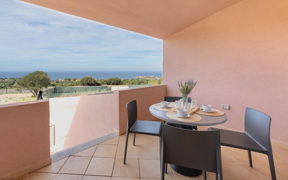 Фото Residence with pool in Isola Rossa