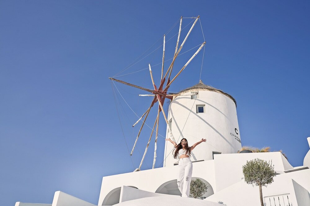 Фото Charisma Suites