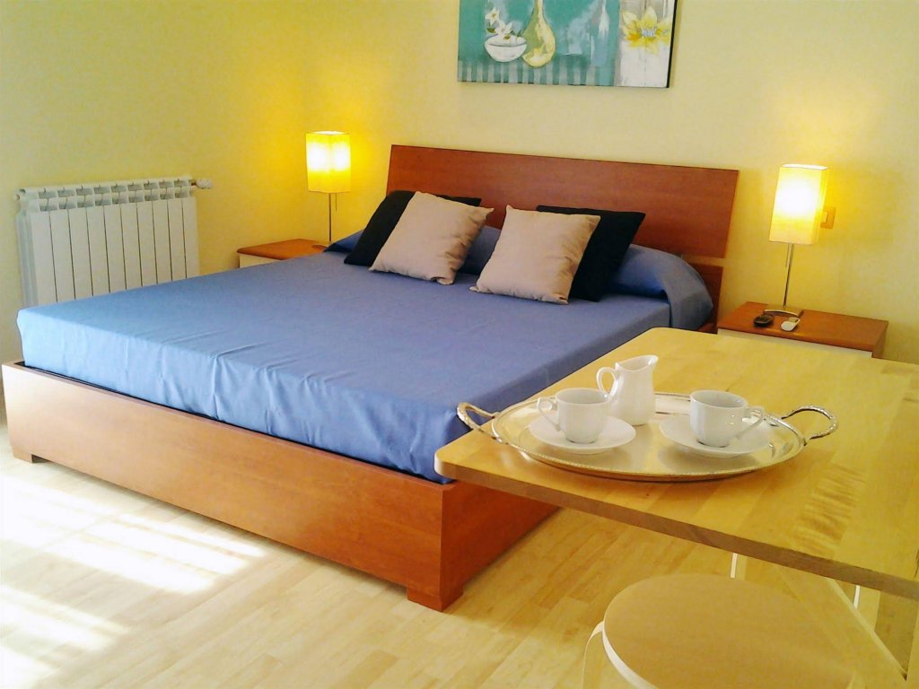 Фото  Pinidiroma Rooms and Suites