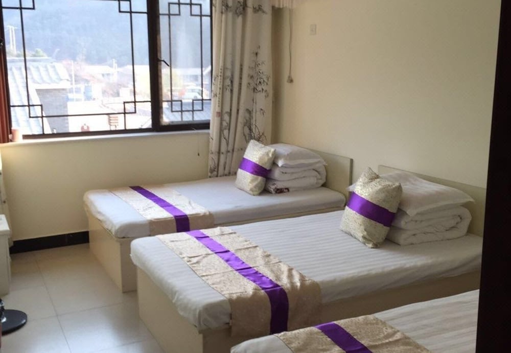 Фото Xinyue Folk Farmhouse Inn