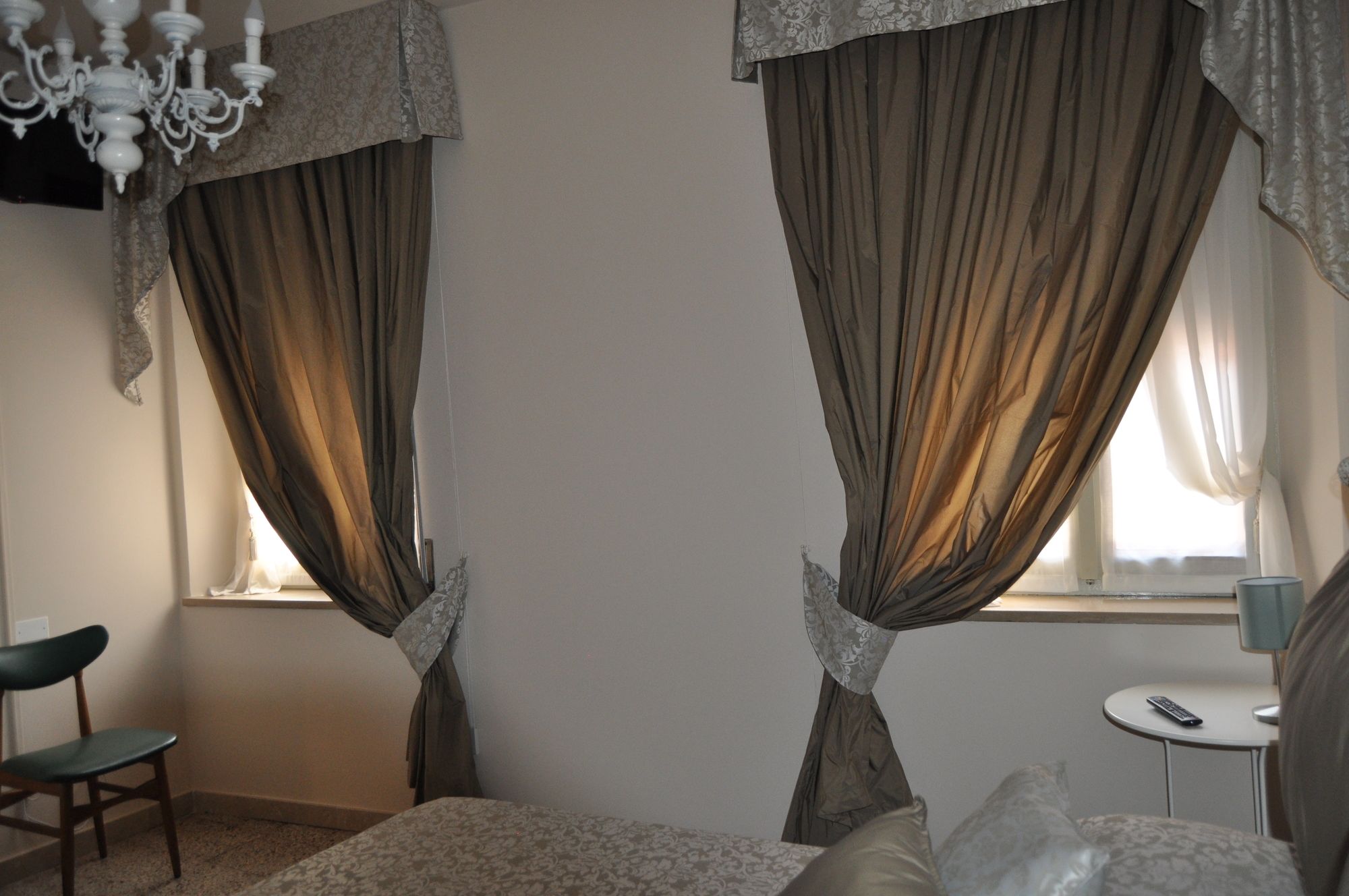 Фото Le Finestre Sul Borgo Rooms