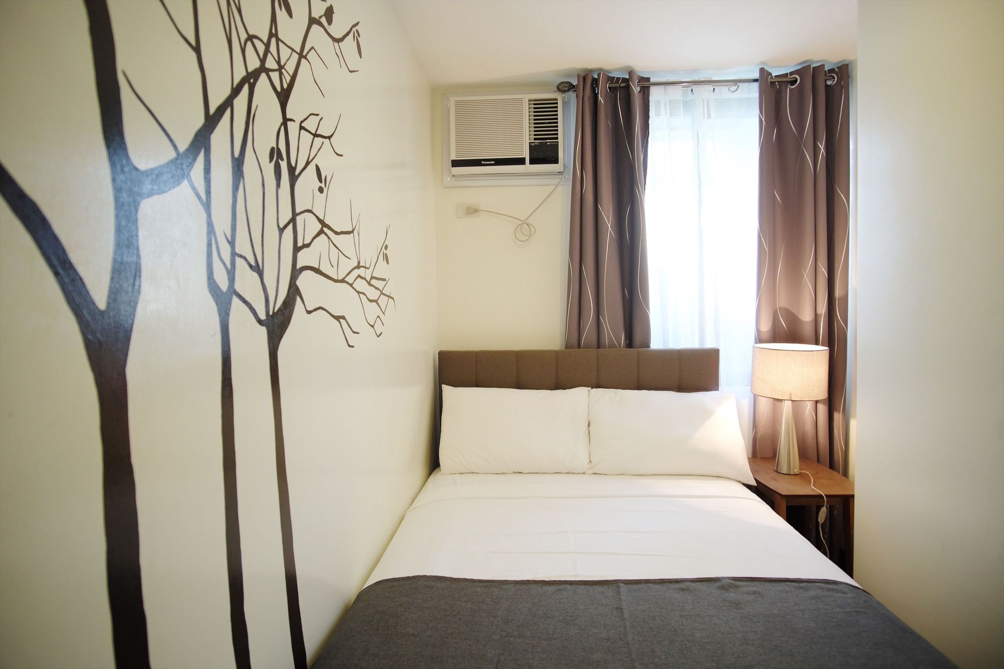 Фото Artemis Place Makati Hotel