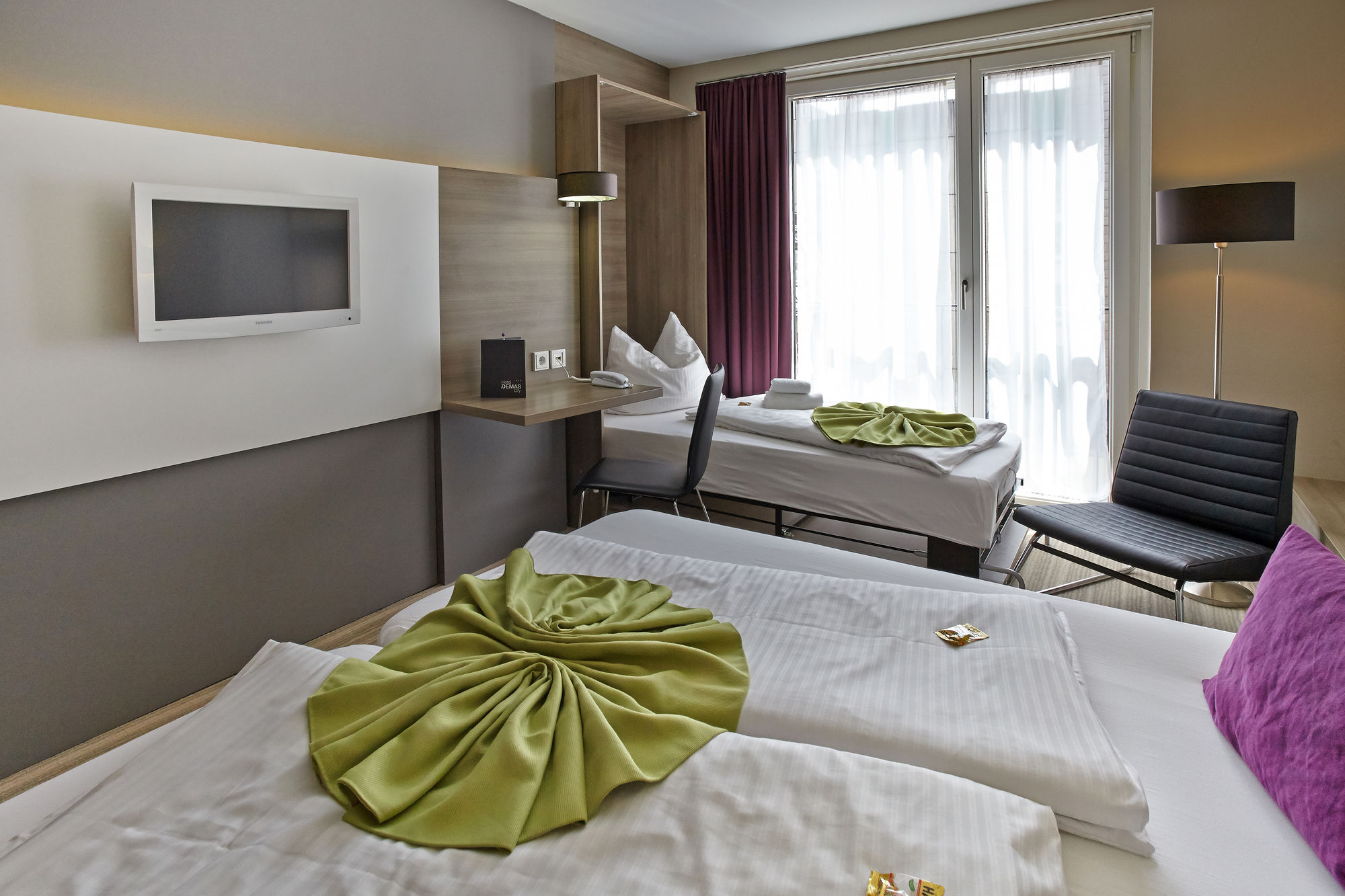 Фото Hotel Demas City