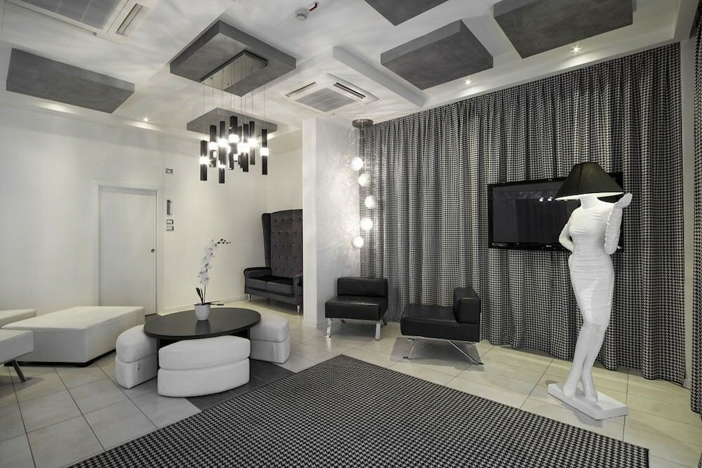 Фото Atmosphere Suite Hotel