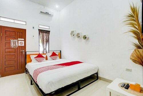 Гостиница Oyo 90124 Oemah Ratu Hostel Syariah в Бандар-Лампунге