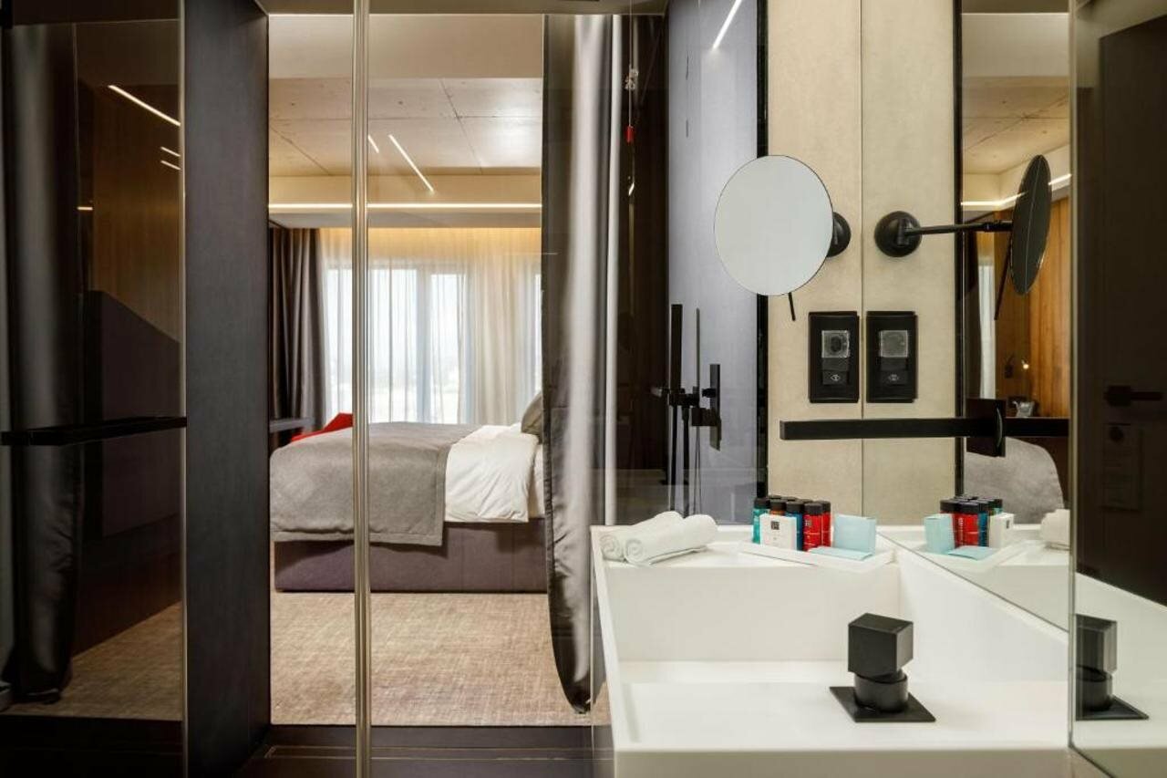 Фото Qosmo Brasov Hotel