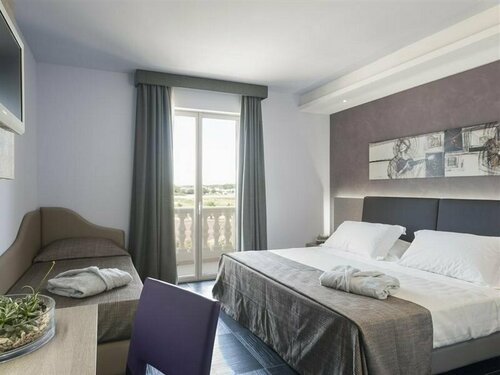 Внешний вид отеля Le Dune Suite Hotel в Порто Чезарео, фото 4