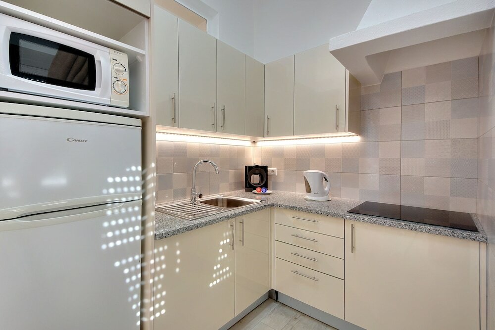 Фото Apartamentos Tucha