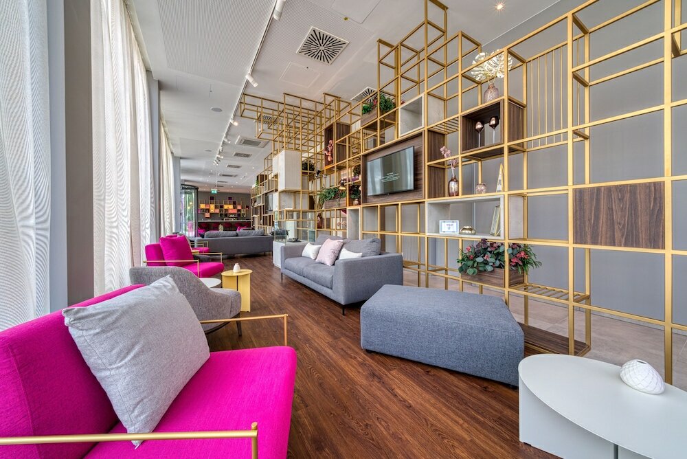 Фото Plaza Premium Muenchen