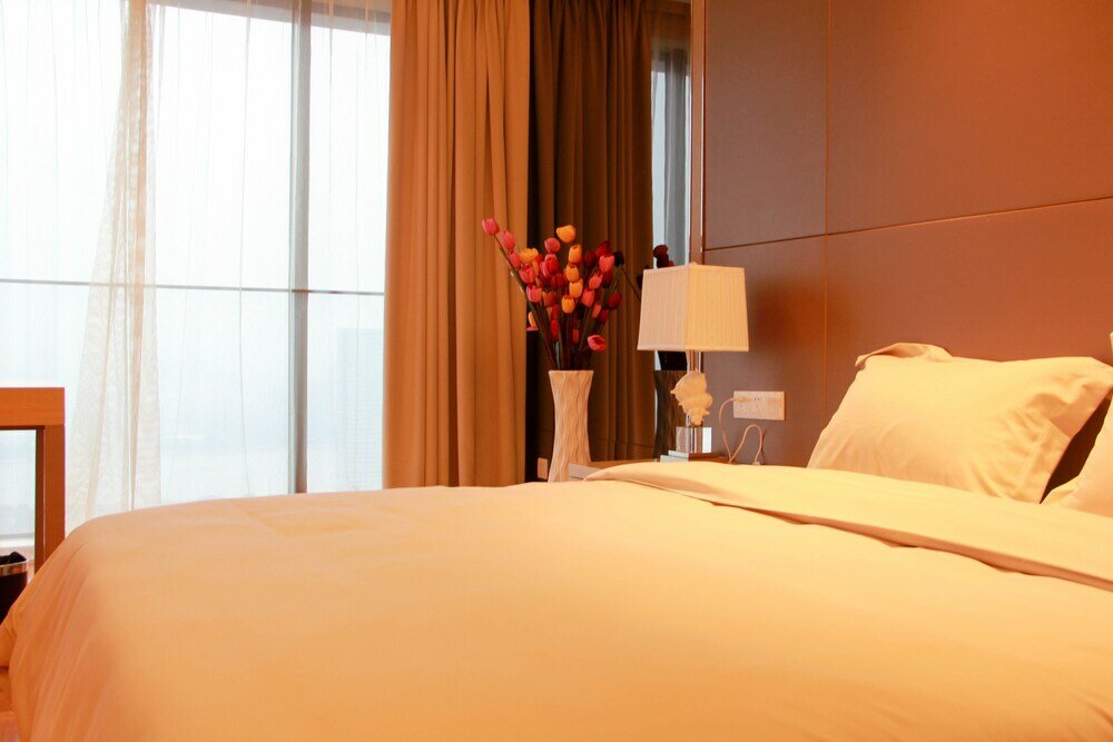 Фото Xingyi International Hotel Poly Store