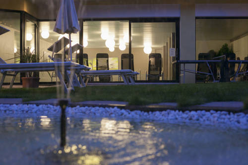 Фото Alpine City Wellness Hotel Dominik