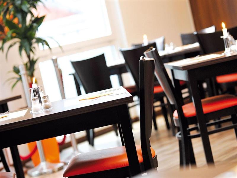 Фото Orange Hotel und Apartments