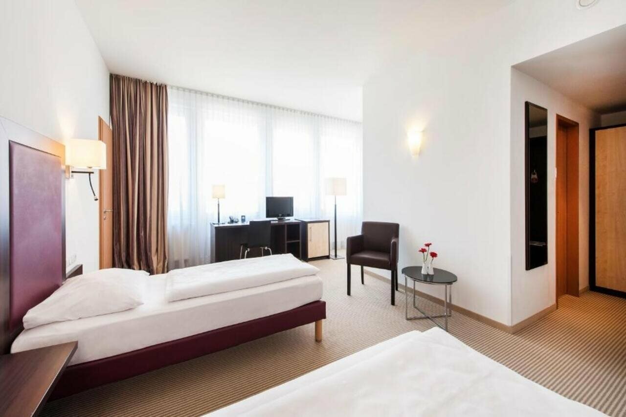 Фото Acom-Hotel Munich