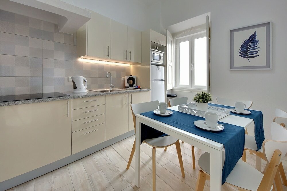 Фото Apartamentos Tucha