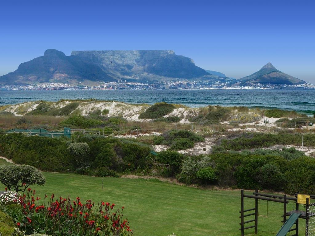 Фото Dolphin Beach Hotel