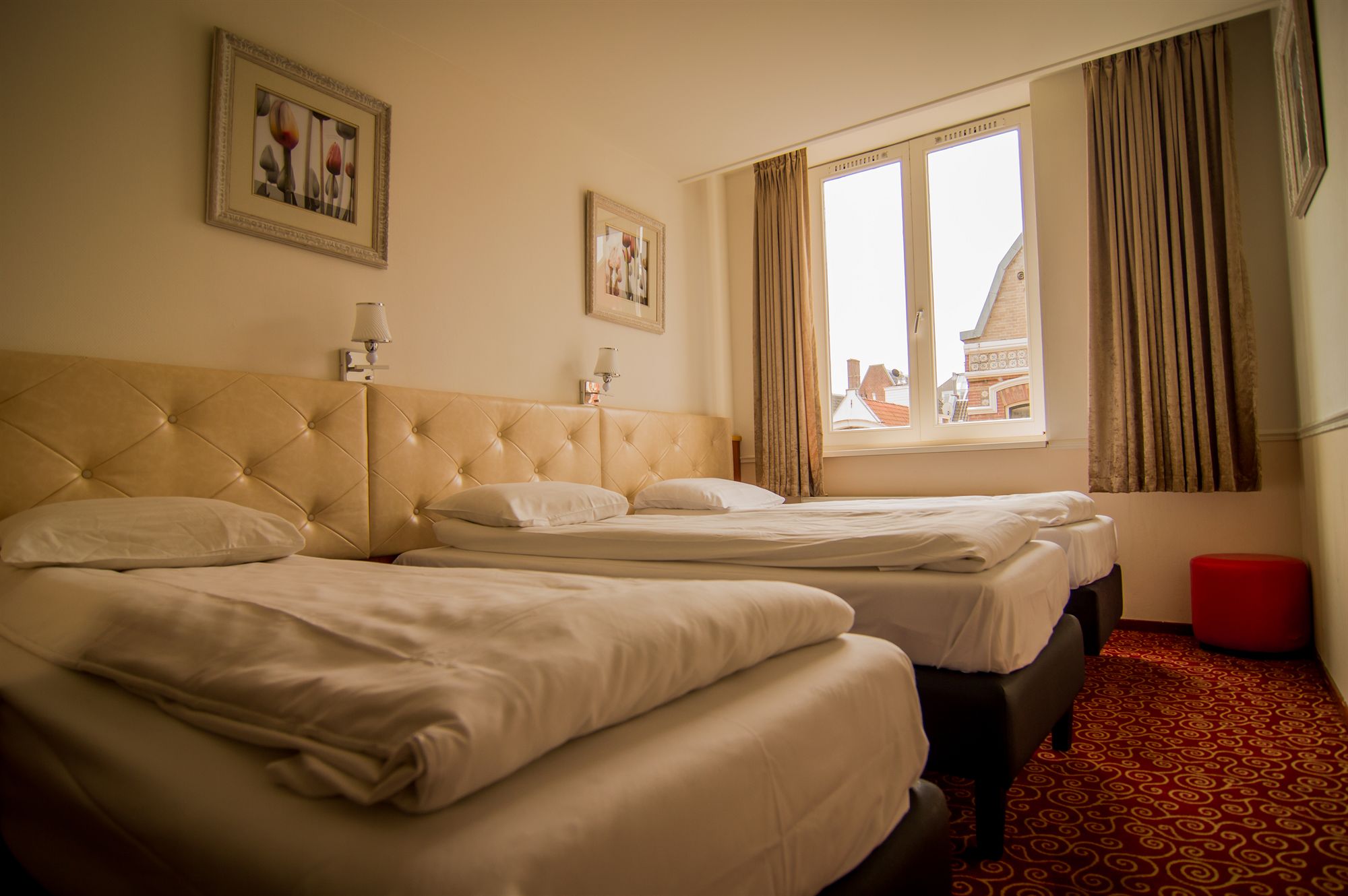 Фото Amsterdam Downtown Hotel