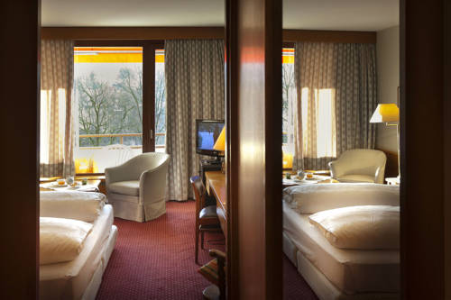 Фото Alpine City Wellness Hotel Dominik