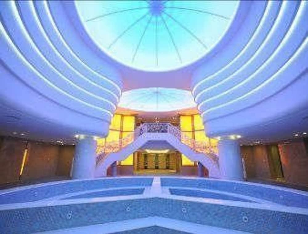 Фото Howard Johnson Tropical Garden Plaza Kunming