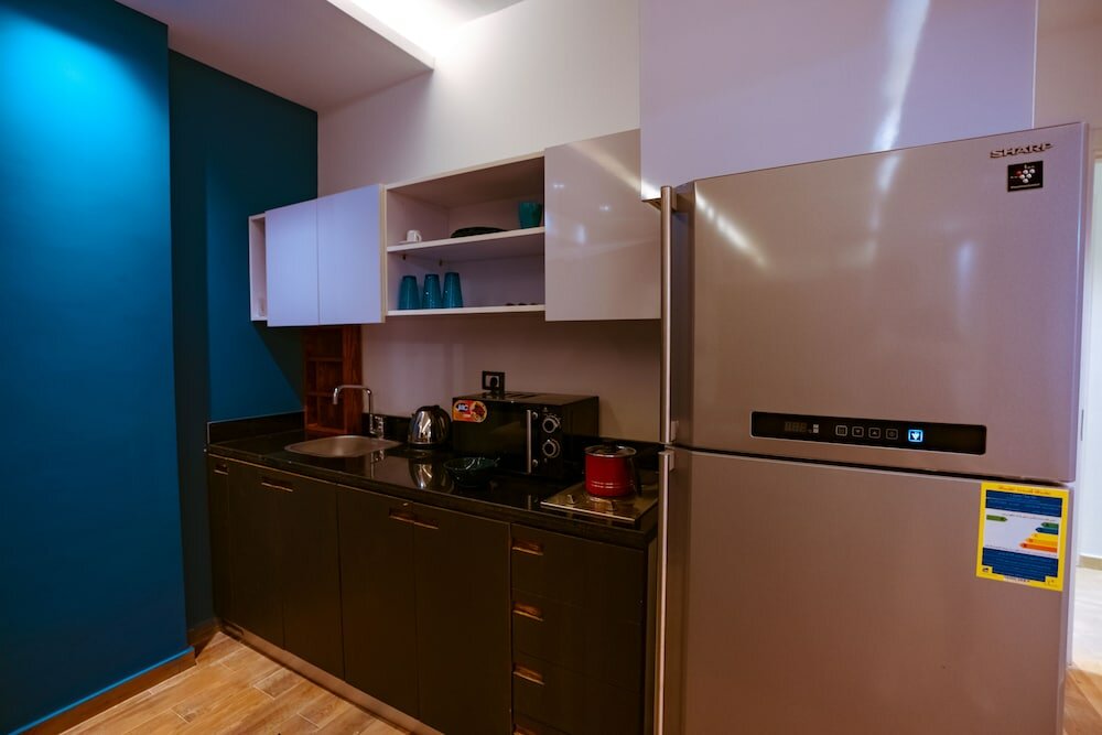 Фото Travelholic Residence New Cairo