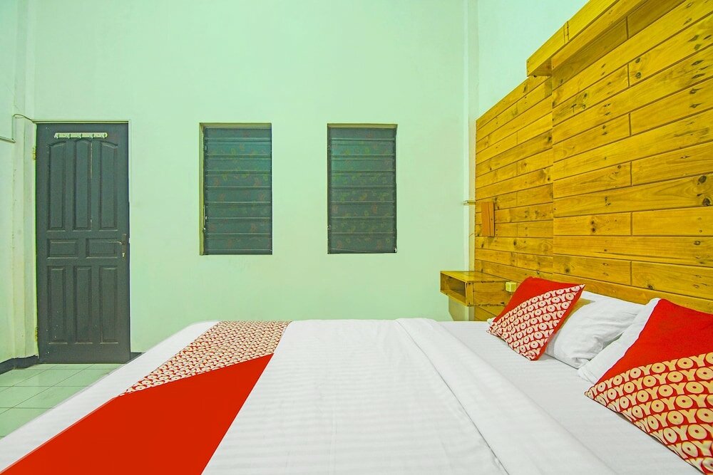 Фото Oyo 91730 De' Mande Homestay Syariah