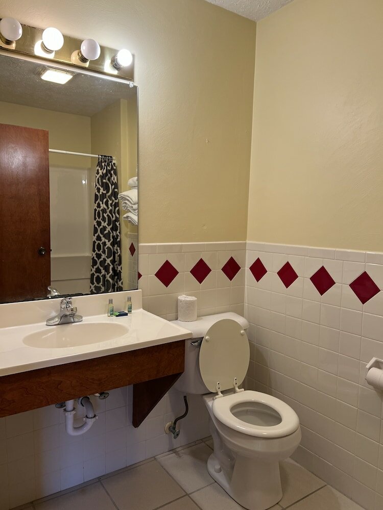 Фото Motel Boutique by Wolf Inn