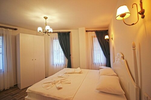 Гостиница İkizler Otel Bozcaada в Бозджааде