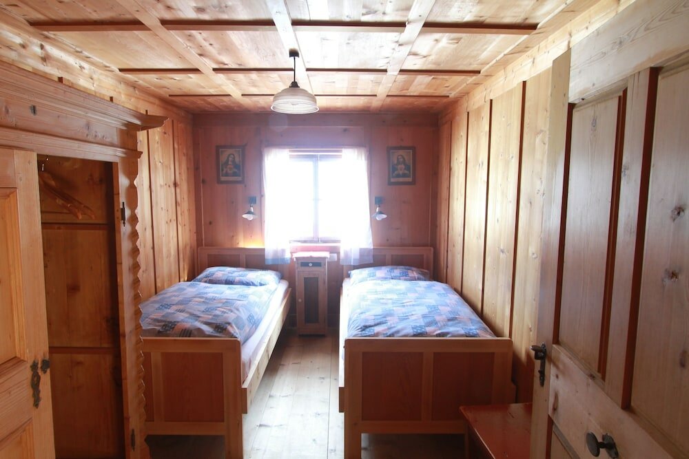 Фото Ferienwohnungen am Berg - Almhütte Alfen