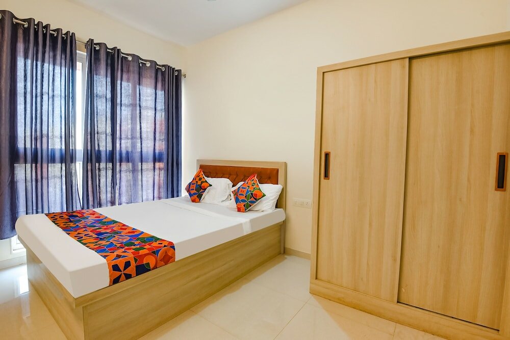 Фото Fabhotel Prime Santoshi Holiday Homes
