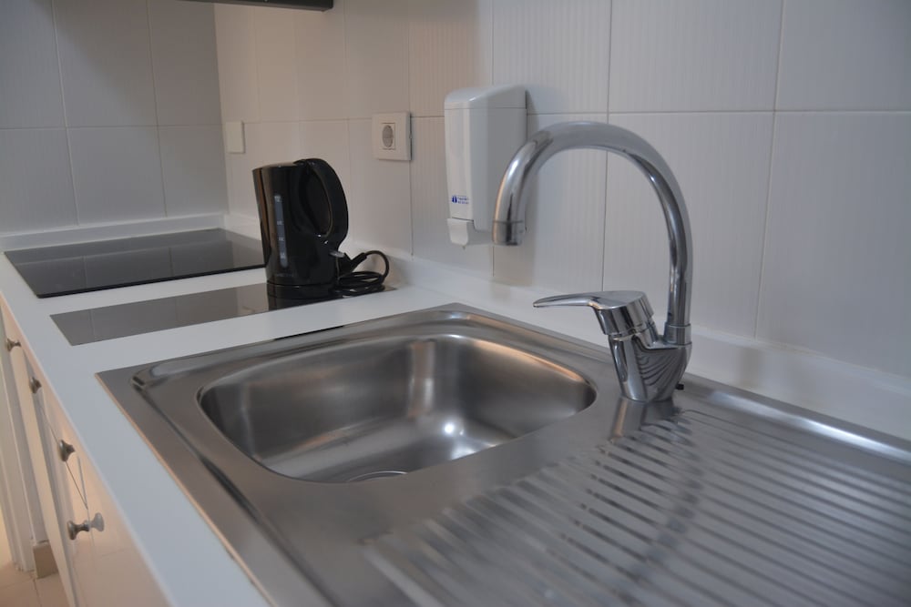 Фото Residencial La Quinta Park Suites