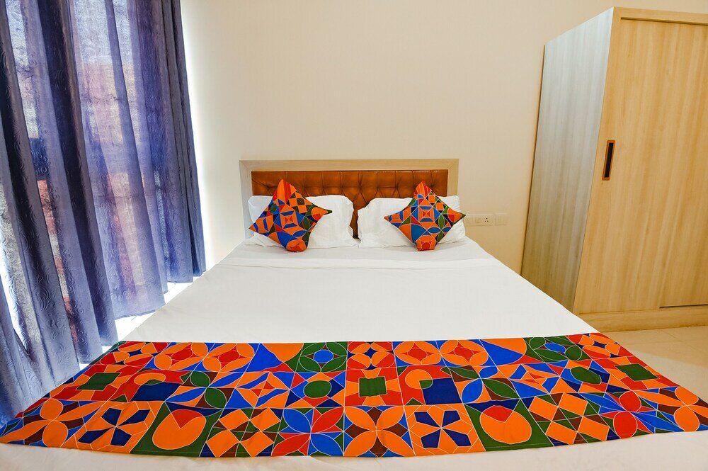 Фото Fabhotel Prime Santoshi Holiday Homes