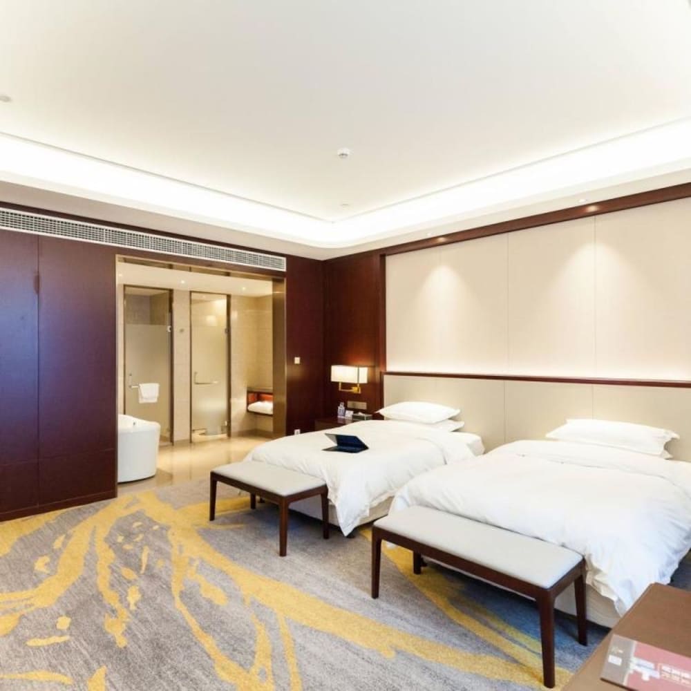 Фото Jinyi Jinglan Hotel