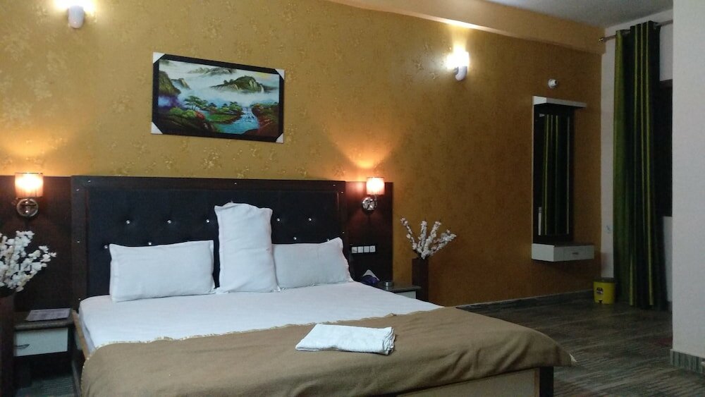 Фото Hotel Zero Mile Rooms