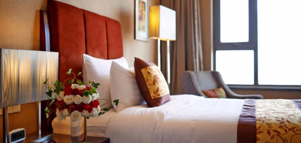 Фото Grand New Century Hotel Binhai Tianjin