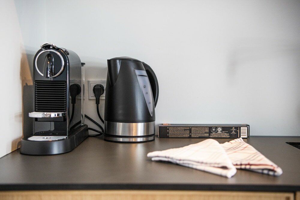 Фото By the Lakes apartments - Into This Place