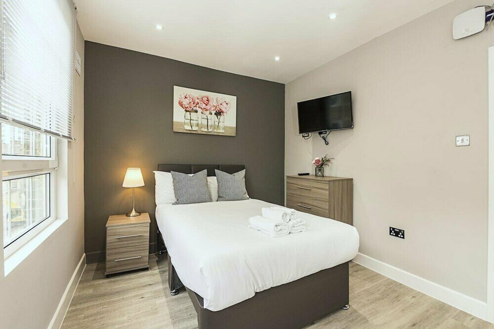 Hotel Toynbee Street Ro 6 · Nice Room On Toynbee Street, London, photo