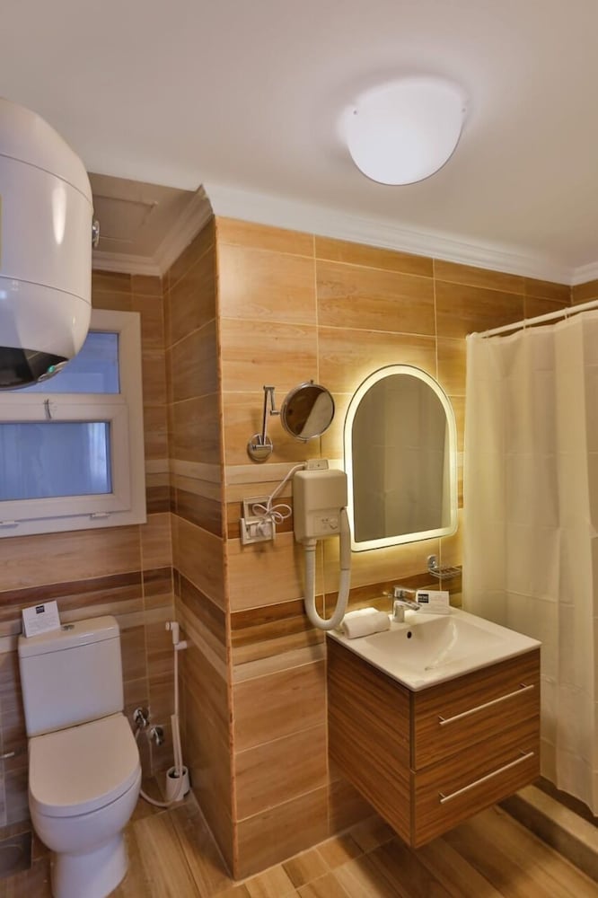 Фото Parkside Boutique Furnished Apartments